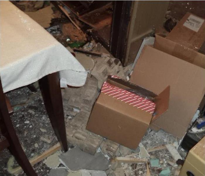 boxes and debris in a home in Memphis, TN