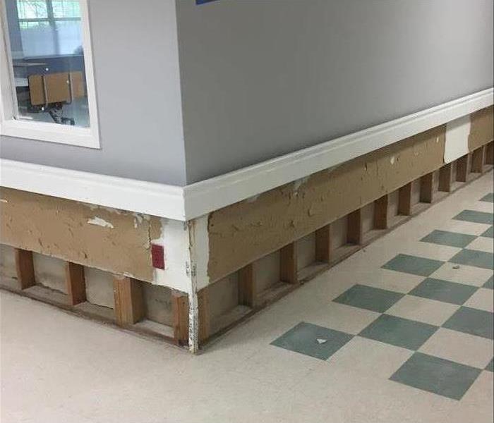 walls with exposed studs and beams in a hospital in Memphis, TN