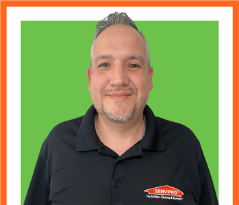 Diego Sachez in front of a green background, SERVPRO Employee, Male