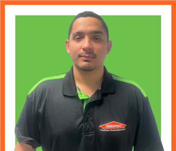Daniel, SERVPRO employee, cut out and set against a green backdrop